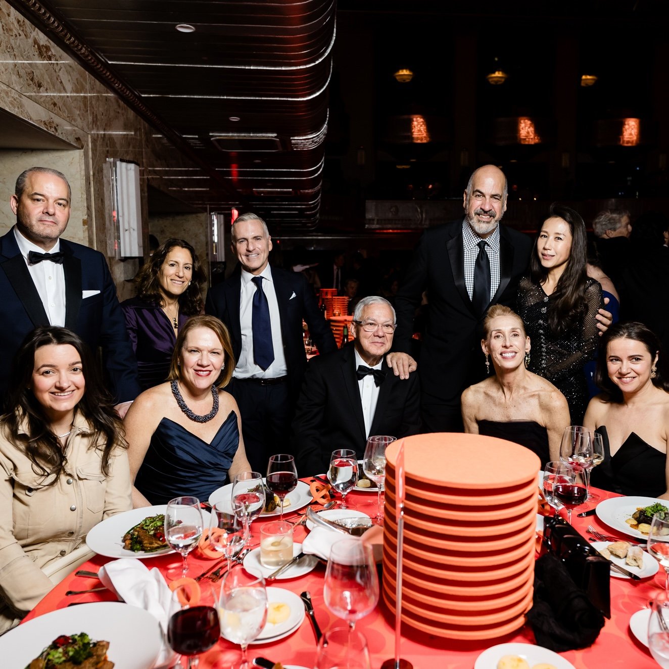 Guests seated at a formal gala dinner table during the Interior Design Hall of Fame event.