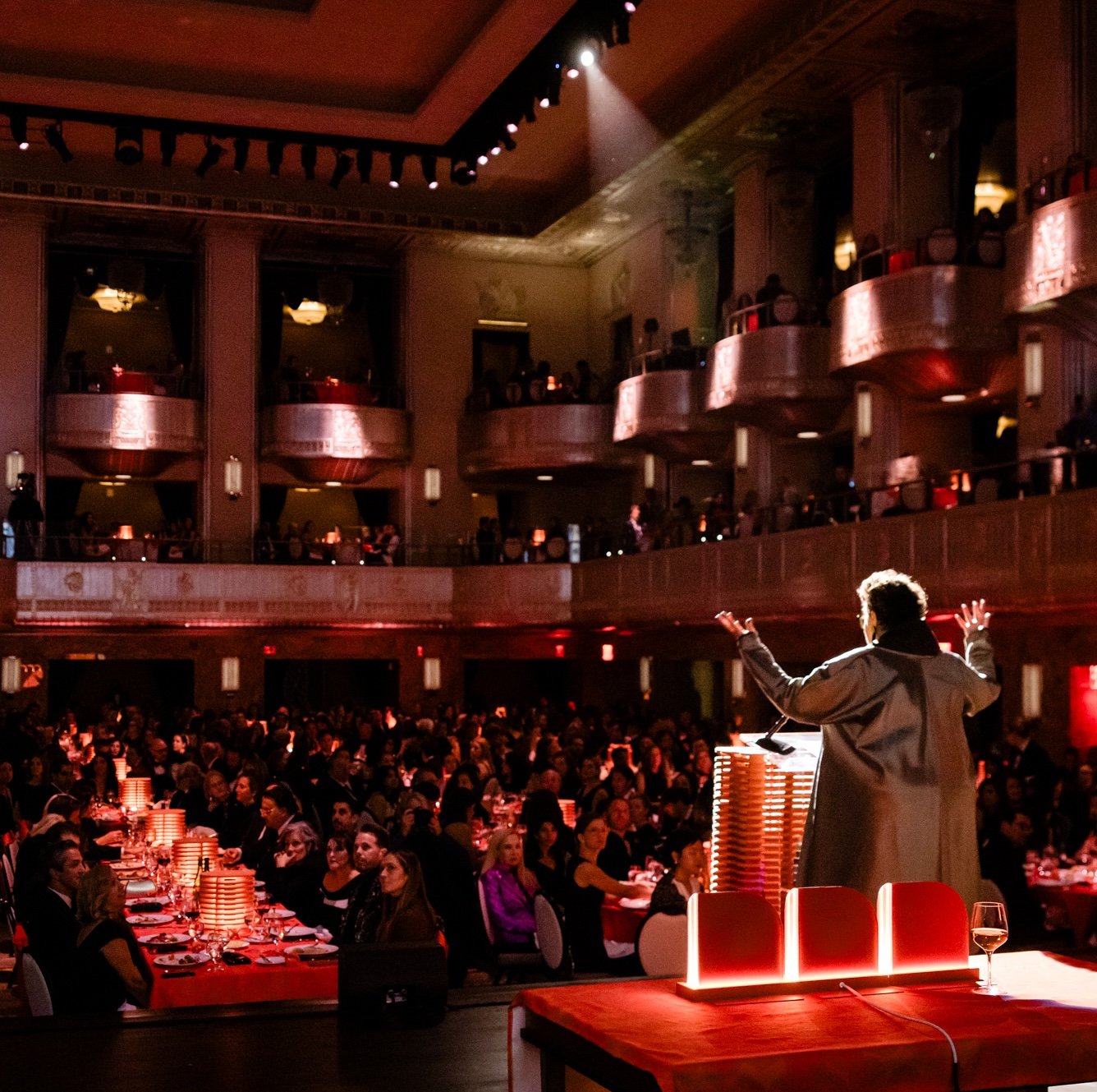 Cindy Allen addressing a full theater during the Interior Design Hall of Fame gala.